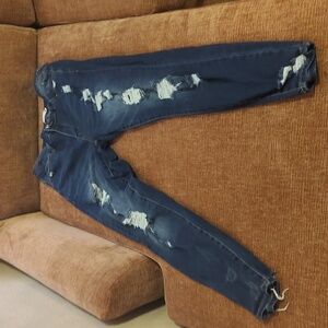 Distressed Blue Women's Jeans Size. 16